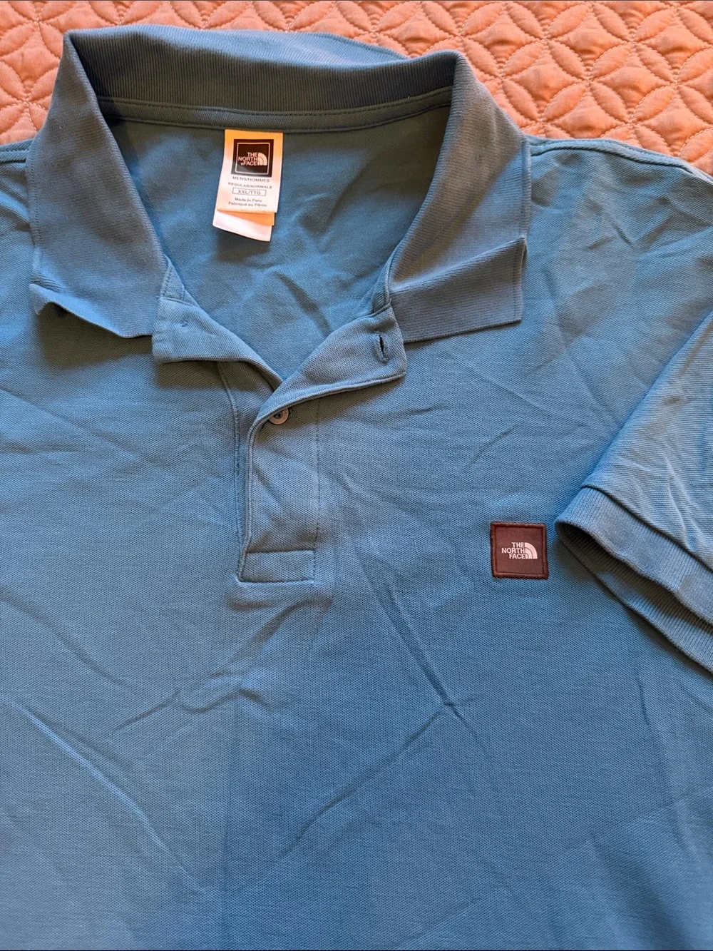 The North Face Men's Teal Blue Polo Shirt with Patch Logo